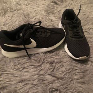 Women’s black Nike shoes